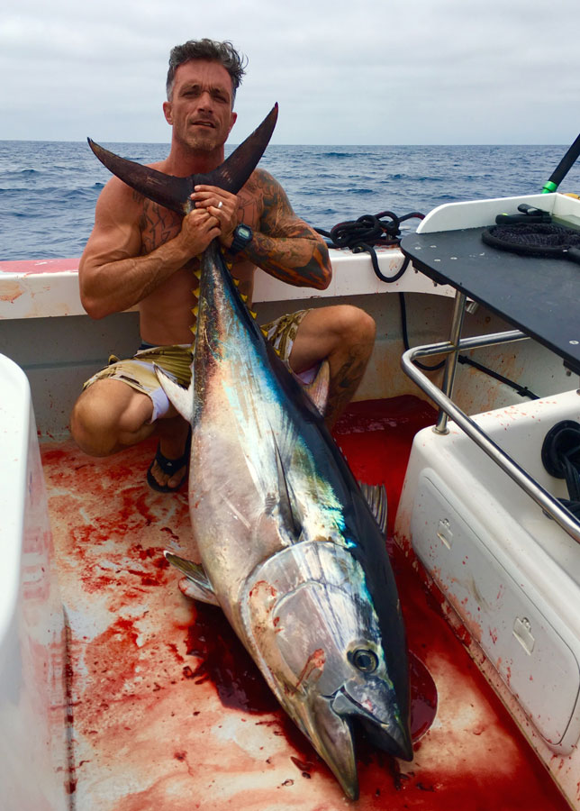 Ryan celebrates a significant bluefin tuna taken aboard 'Opah.'